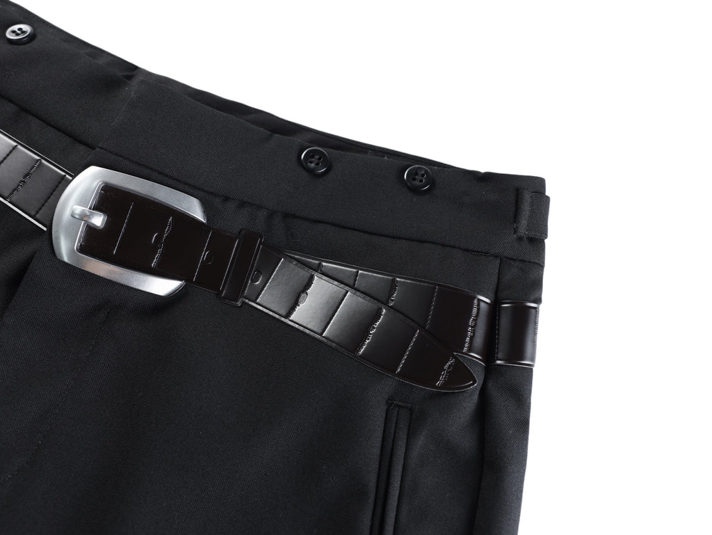 Black pants belt detail with metal buckle and structured belt loops