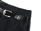 Black pants belt detail with metal buckle and structured belt loops