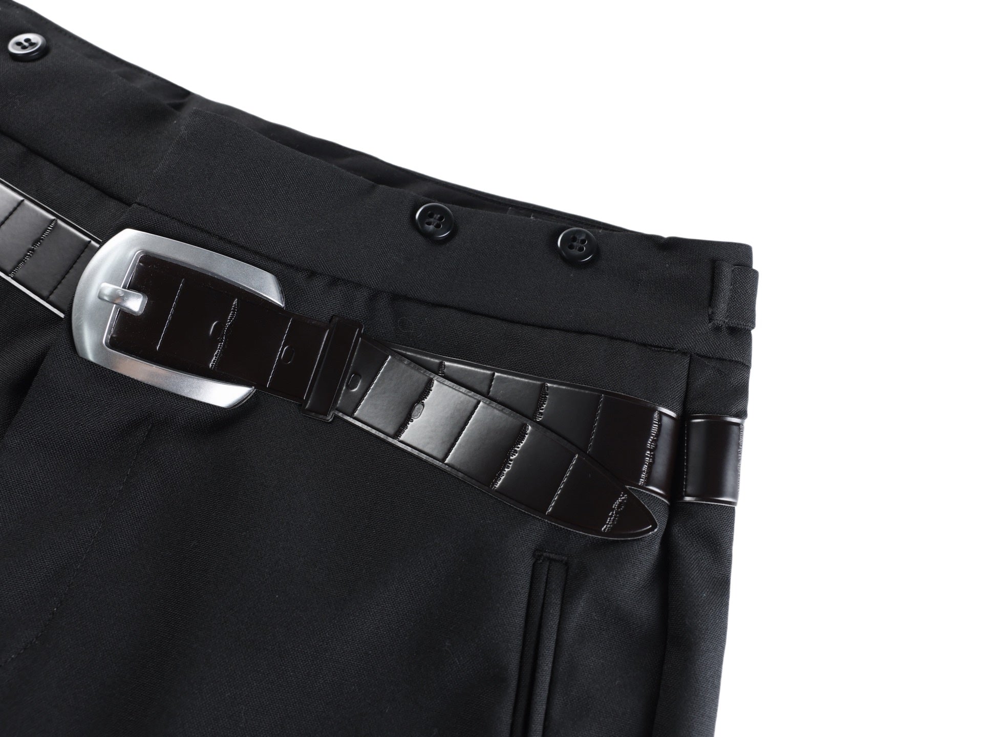 Black pants belt detail with metal buckle and structured belt loops