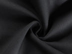 Black fabric close-up with fine textured weave