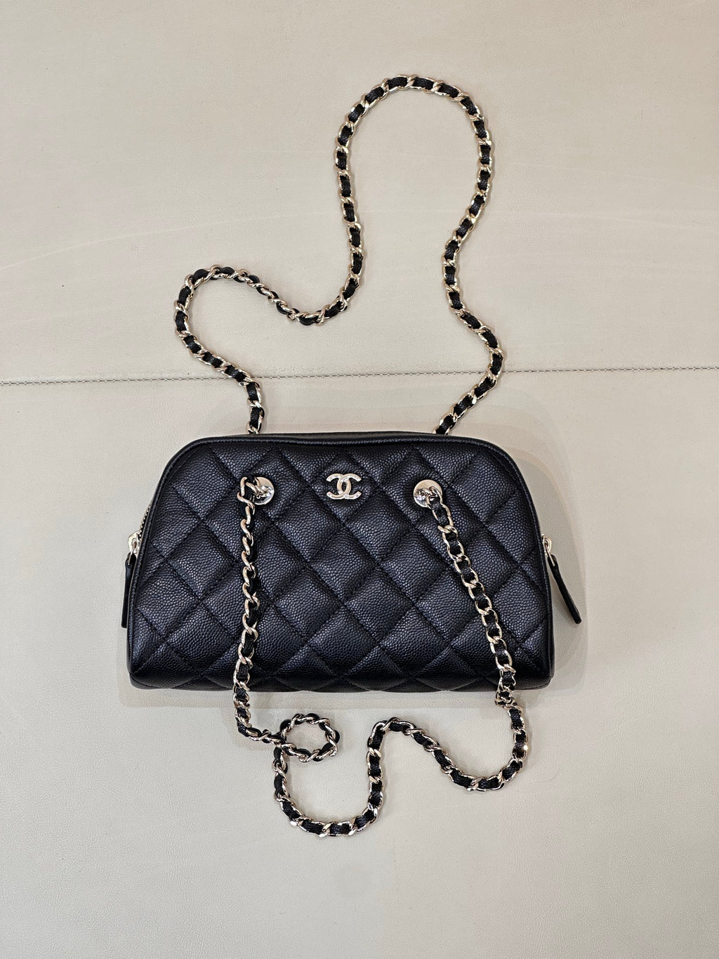 Chanel quilted crossbody bag in dark blue with chain strap and gold-tone hardware