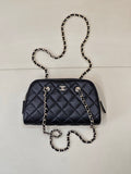 Chanel quilted crossbody bag in dark blue with chain strap and gold-tone hardware