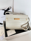 Ivory leather shoulder bag with gold clasp and crossbody strap, front flap detail