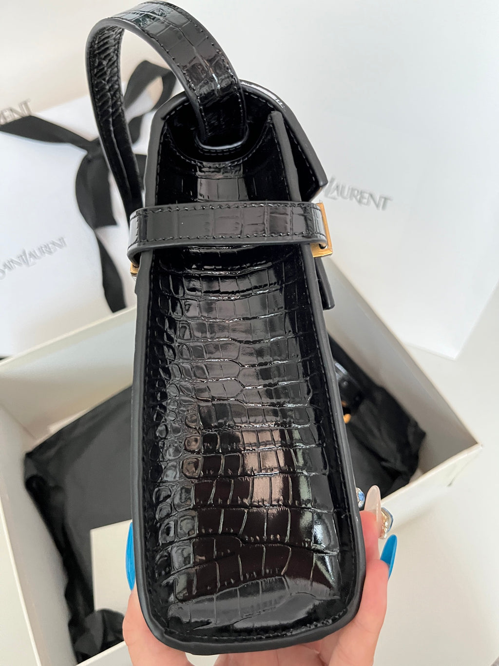 YSL black croc-texture handbag with gold-tone buckle and structured top handle