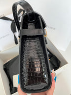 YSL black croc-texture handbag with gold-tone buckle and structured top handle