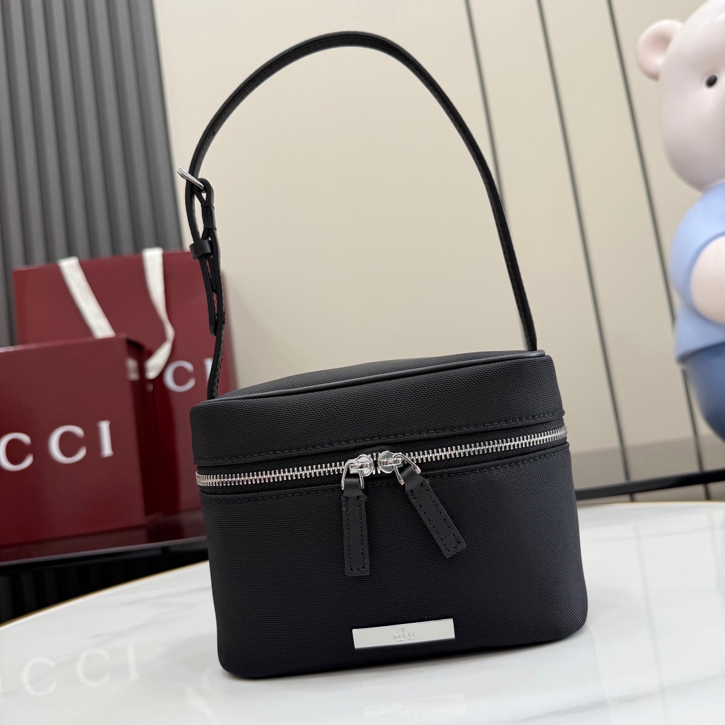 Gucci bag, black pebbled leather mini shoulder bag with top zip closure