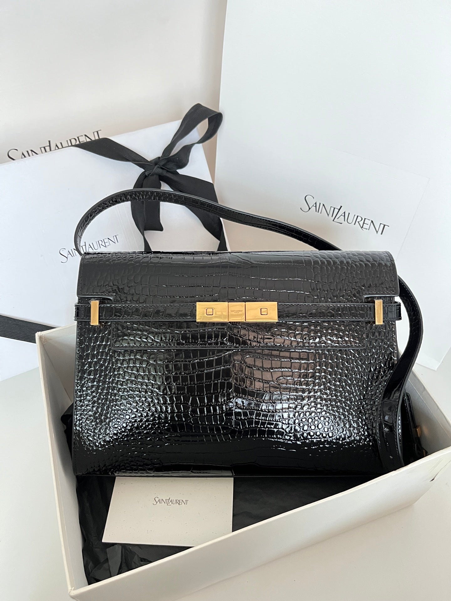 YSL black croc-texture shoulder bag with gold-tone clasp and top handle