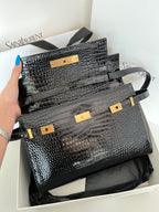 YSL black croc-texture handbag with gold-tone center bar and straps