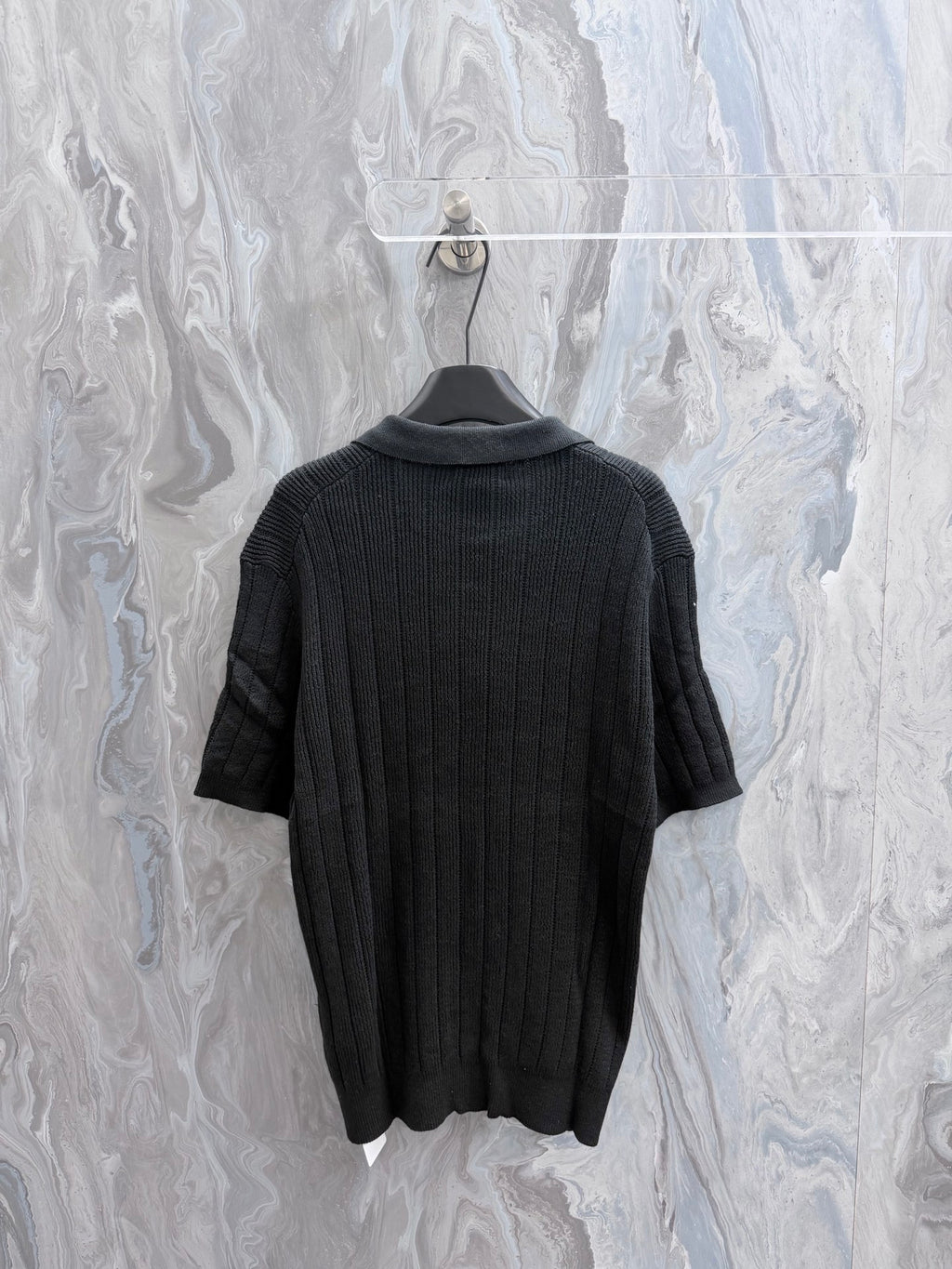 Ralph Lauren knit polo shirt back view in dark charcoal with ribbed collar and hem