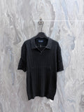 Ralph Lauren knit polo shirt in dark charcoal with short sleeves and button placket