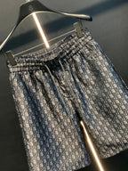 Dior patterned pants with elastic waistband and detailed all-over monogram fabric