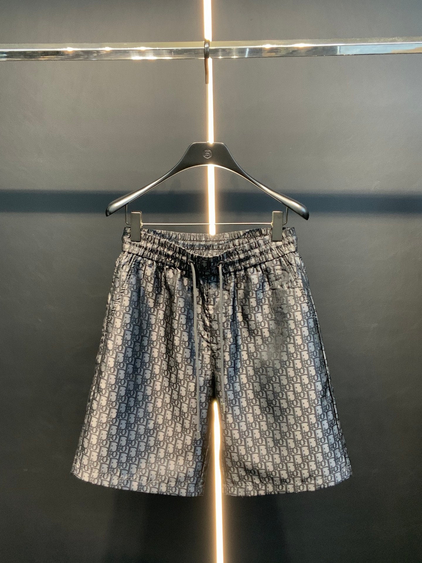 Dior patterned pants with elastic waistband and all-over blue monogram print