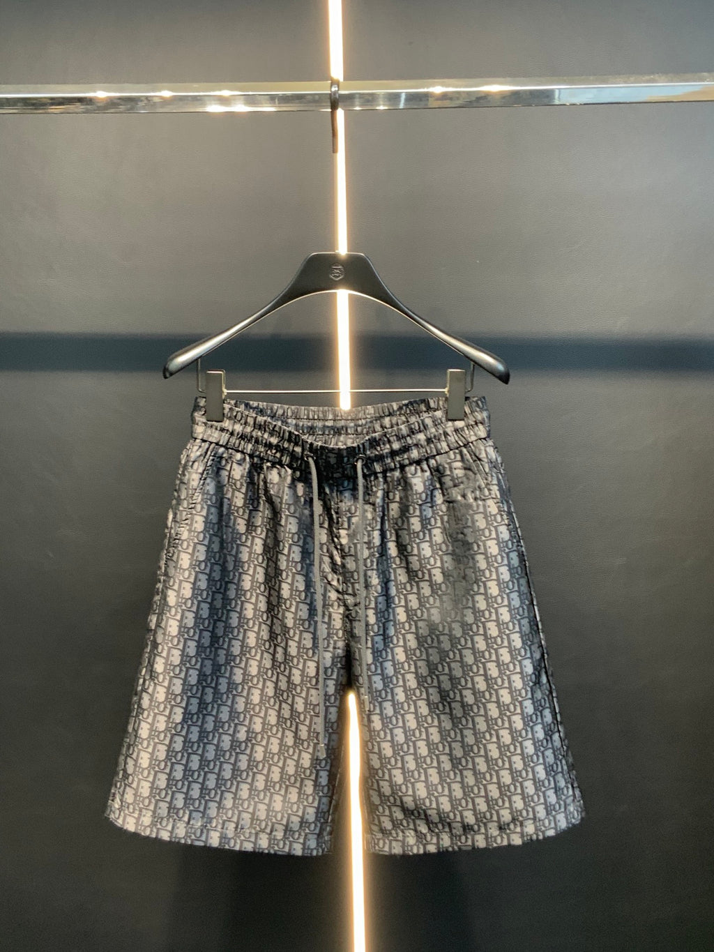 Dior patterned pants with elastic waist, wide legs, and blue-gray monogram print