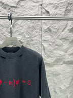 Balenciaga dark blue crew-neck T-shirt close-up with red math formula print, short sleeves