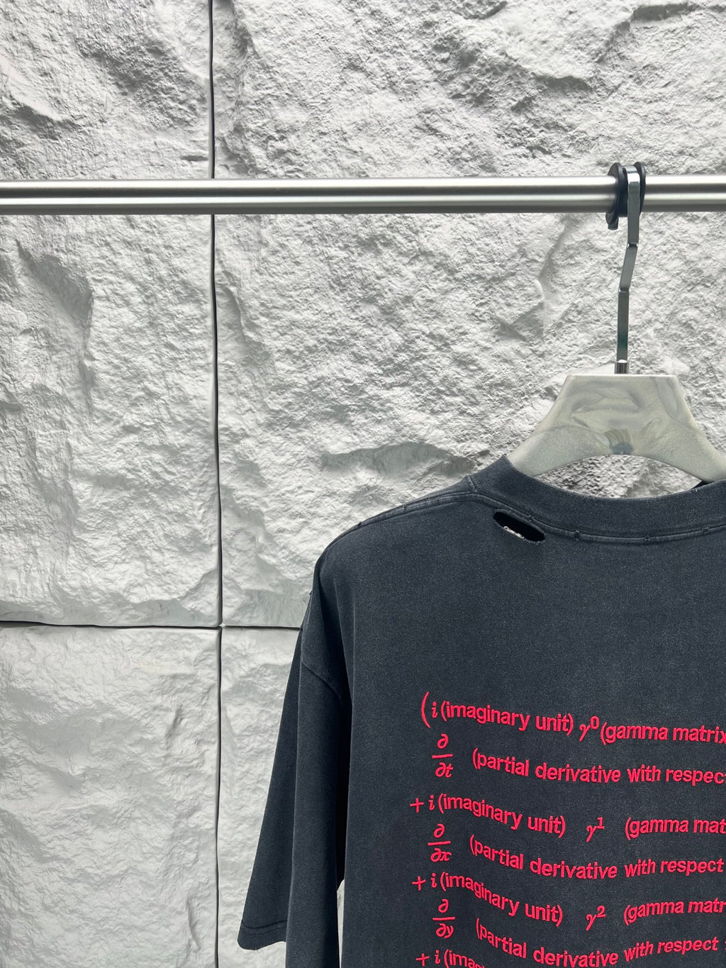 Balenciaga dark blue crew-neck T-shirt close-up with red formula text, short sleeves