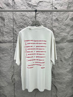 White short-sleeve T-shirt with small multiline red text graphic