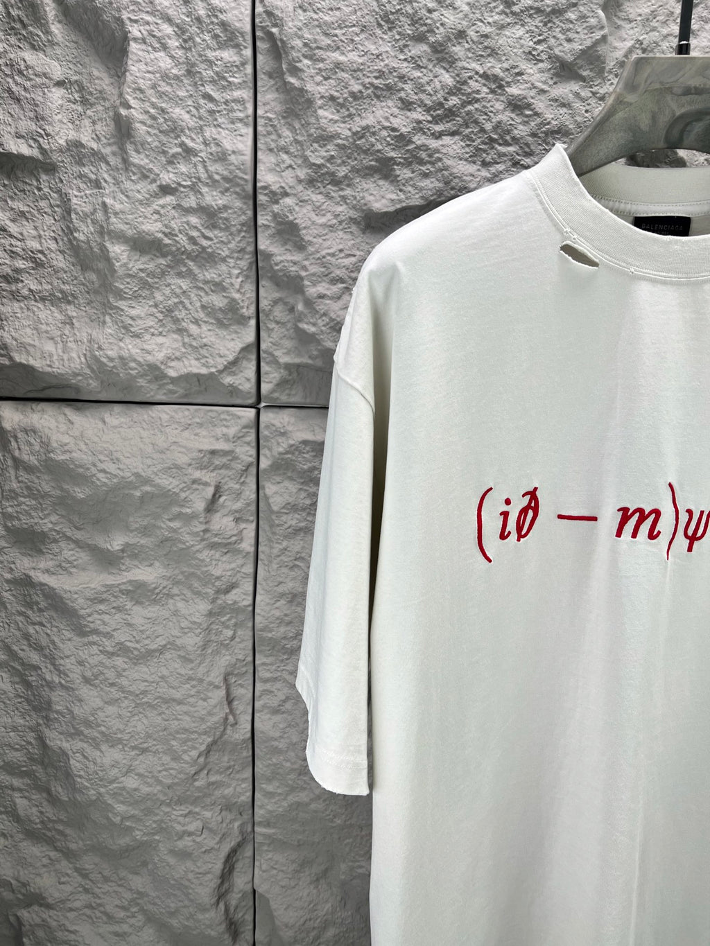White short-sleeve T-shirt, crew neck, partial red graphic print
