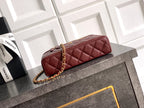 Chanel quilted top-handle bag in burgundy leather with gold chain and zipper