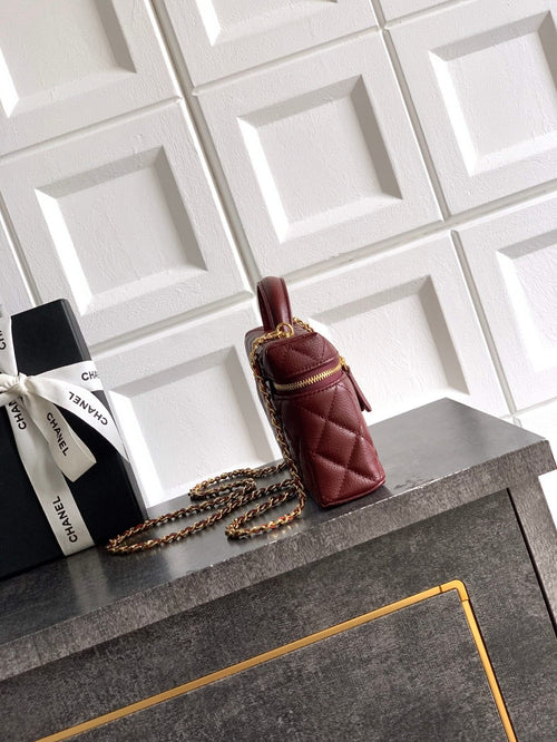 Chanel quilted crossbody handbag in burgundy leather with gold chain strap