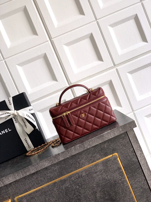 Chanel quilted top-handle handbag in burgundy leather with gold chain strap