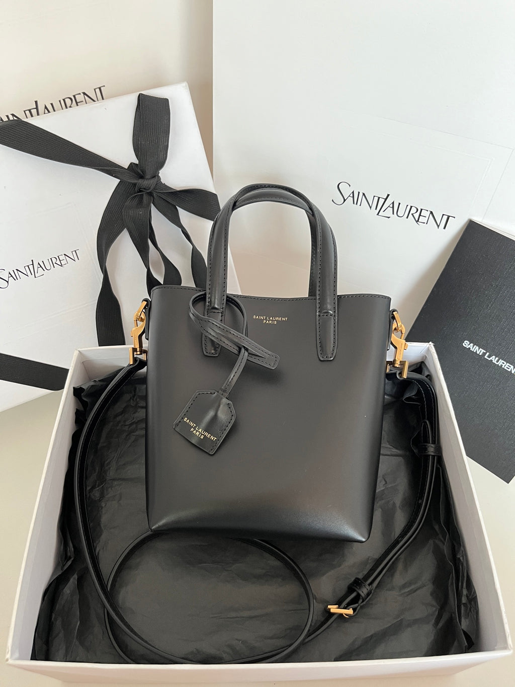 YSL dark gray leather tote bag with bow charm and gold-tone hardware