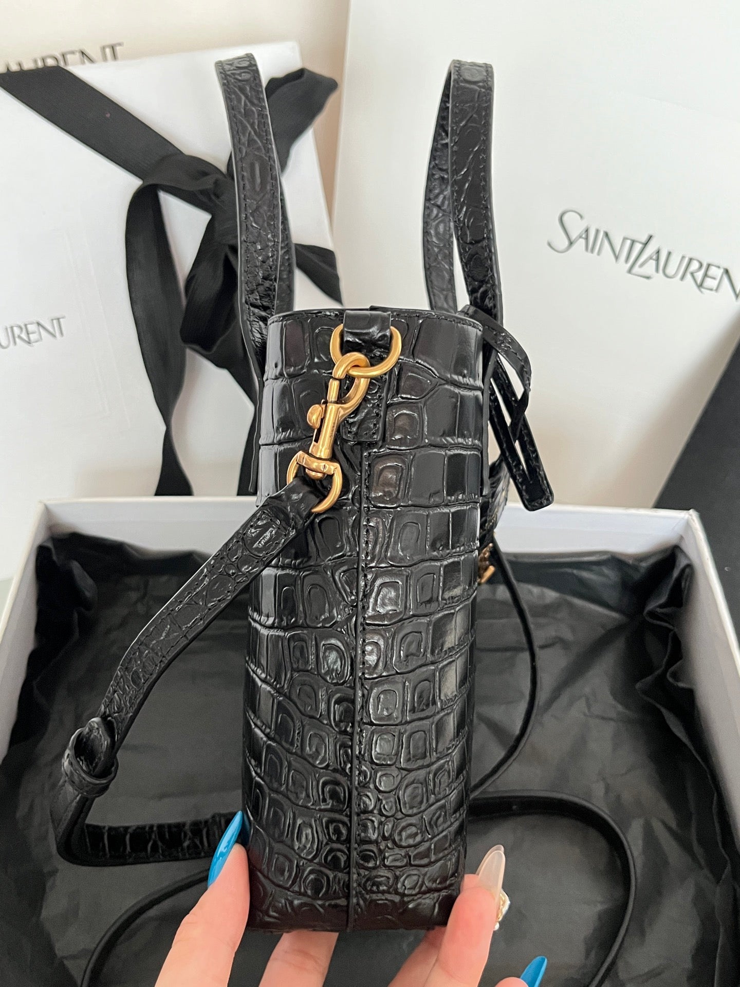 Black croc-embossed leather tote bag with front YSL clasp and crossbody strap