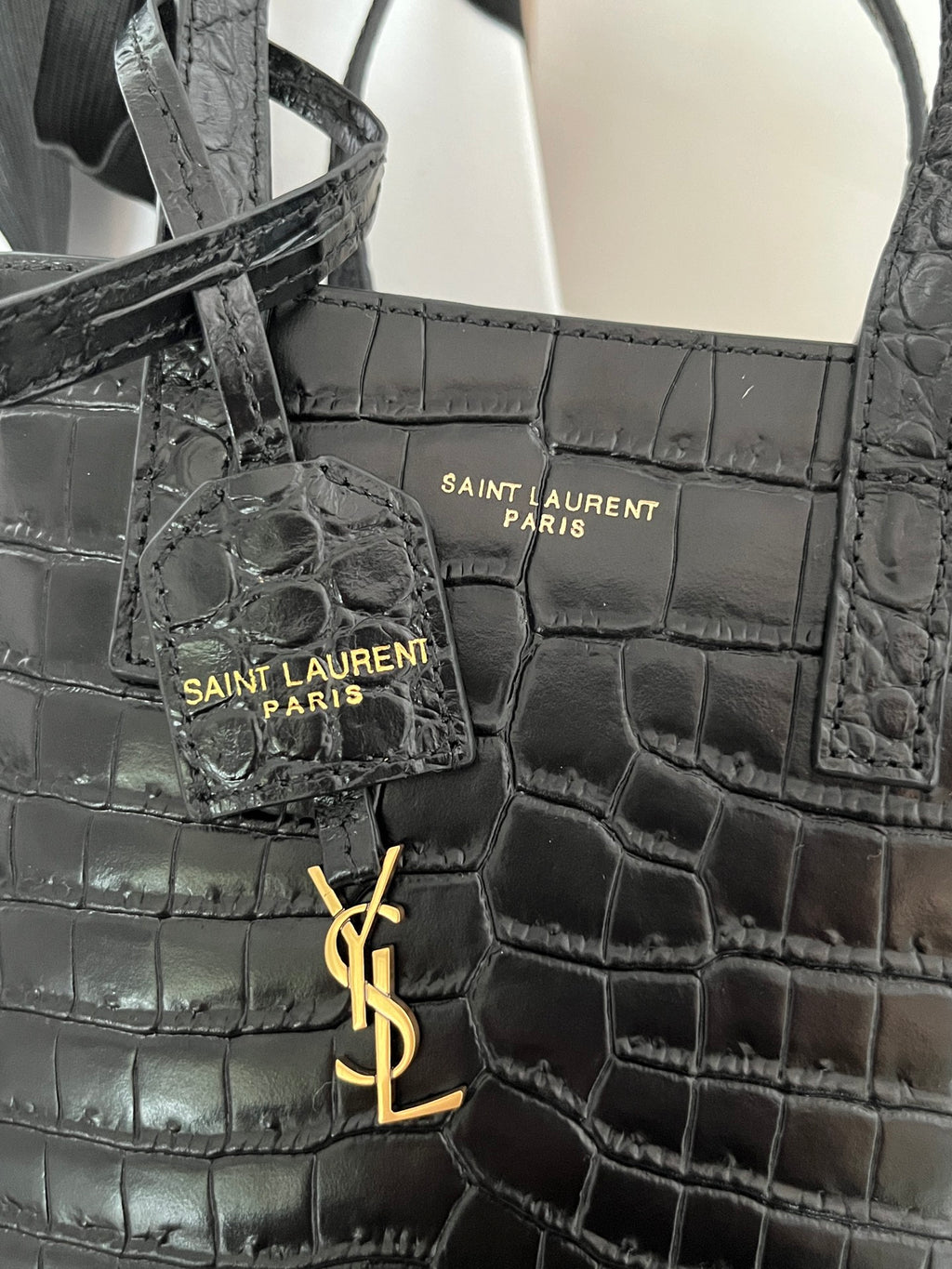 Black croc-embossed leather tote with front panel and YSL logo hardware