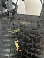 Black croc-embossed leather tote with front panel and YSL logo hardware