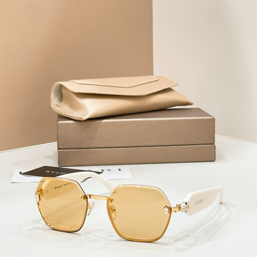 Bvlgari sunglasses with gold-tone frames and amber gradient hex lenses