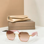 Bvlgari sunglasses with gold-tone frames and pink-tinted gradient lenses