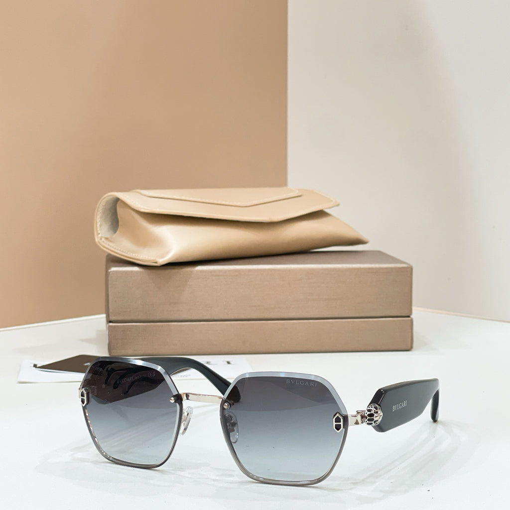 Bvlgari sunglasses with silver-tone frames and blue gradient square lenses