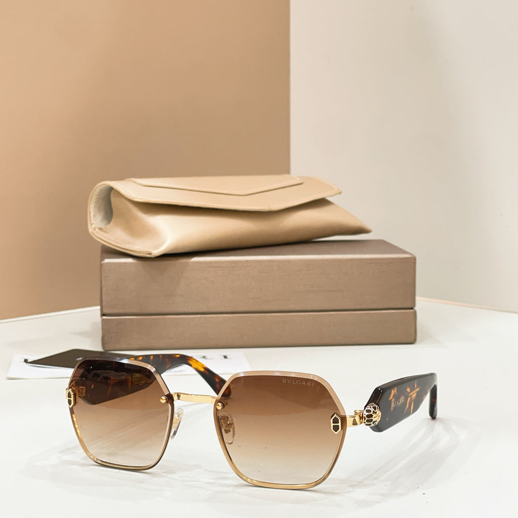 Bvlgari sunglasses with gold-tone frames and brown gradient octagonal lenses