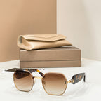 Bvlgari sunglasses with gold-tone frames and brown gradient octagonal lenses