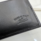 Gucci leather wallet stamp detail reading "MADE IN ITALY".