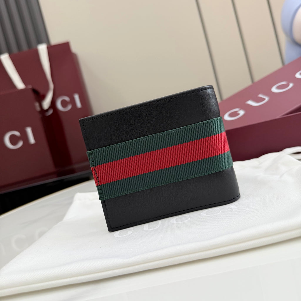 Gucci small leather wallet, black with green-red-green web stripe on front panel.