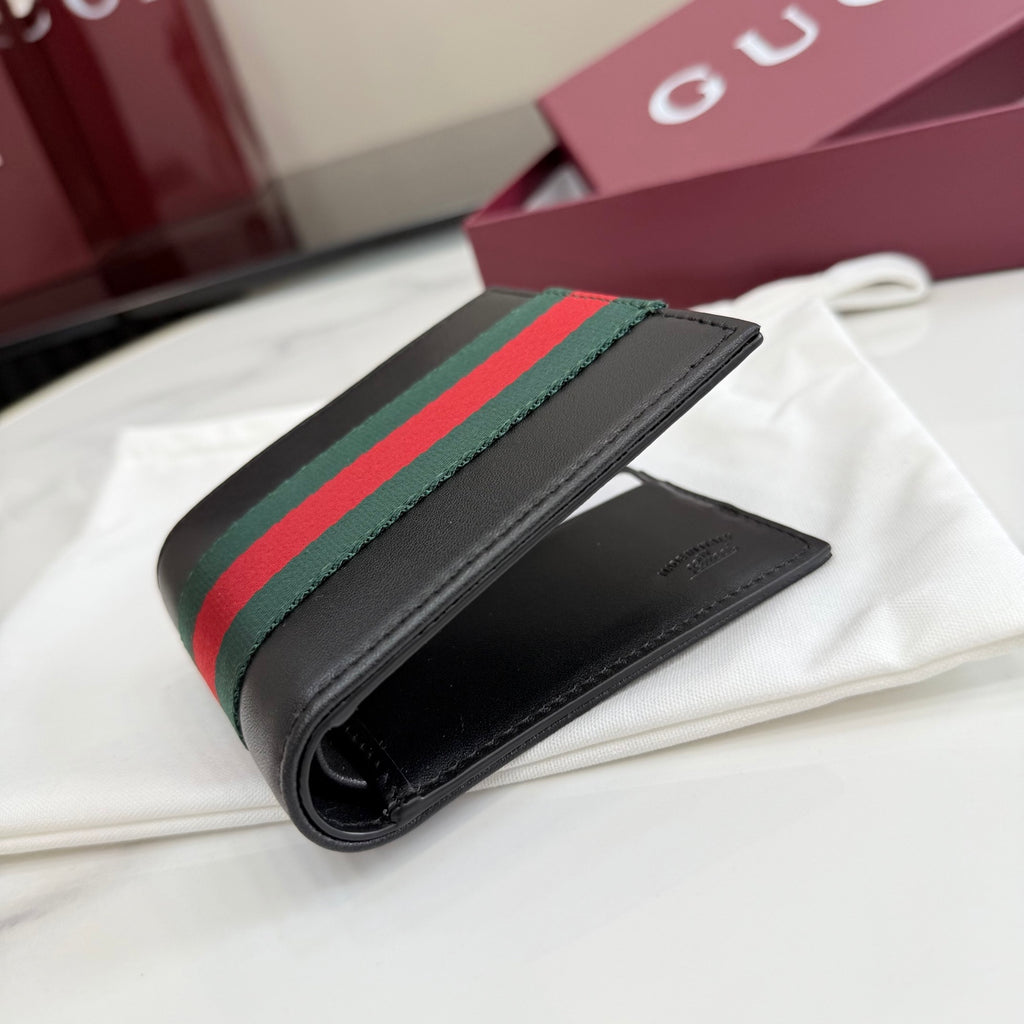 Black leather card holder, open side, with green and red stripe