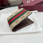 Gucci card case with GG canvas front and brown leather back, open view
