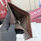 Gucci small wallet interior view with brown leather lining and card slot opening