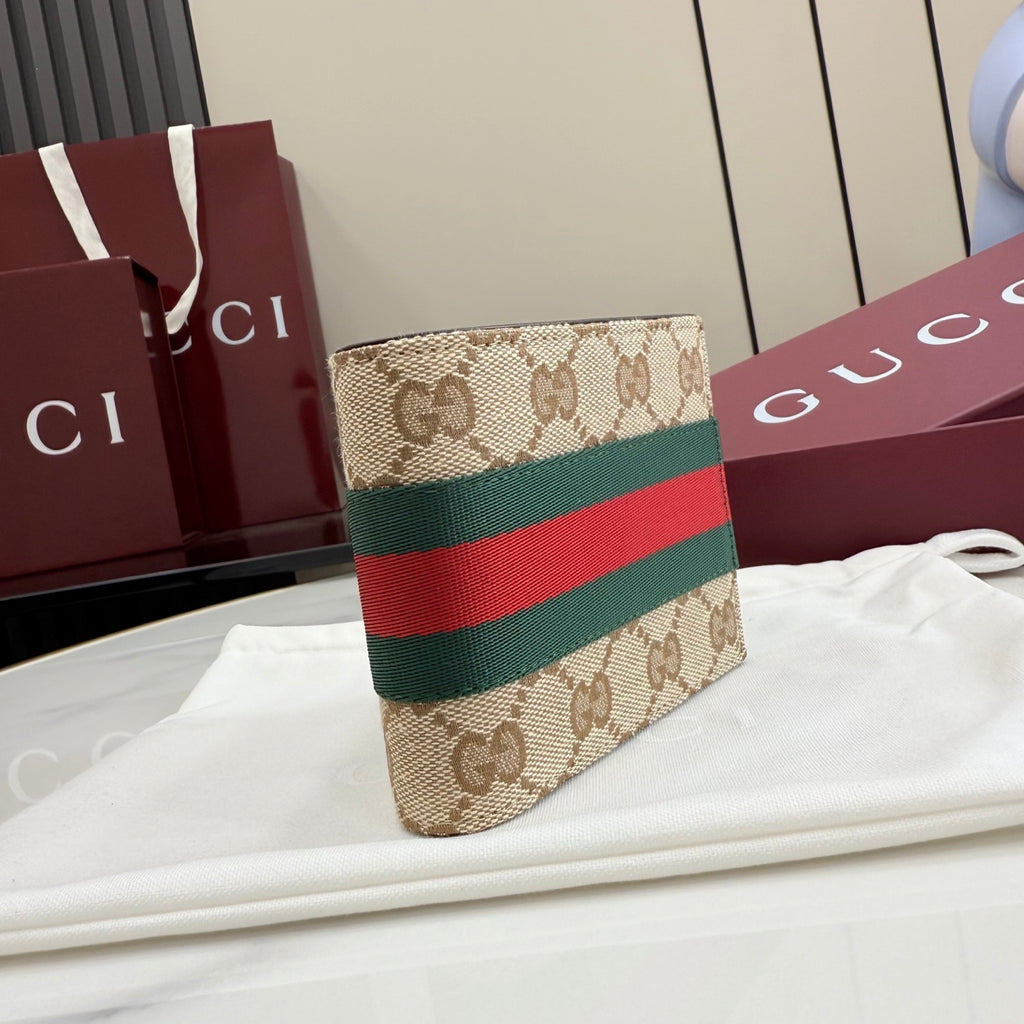 Gucci small card wallet with GG canvas, green and red web stripe, angled front