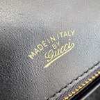 Gucci bag leather with gold 'Made in Italy' stamp and stitched edge