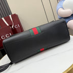 Gucci bag in dark leather with green-red stripe band and shoulder strap