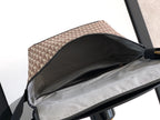 Dior bag open top view with black lining and beige monogram exterior, shown with strap.