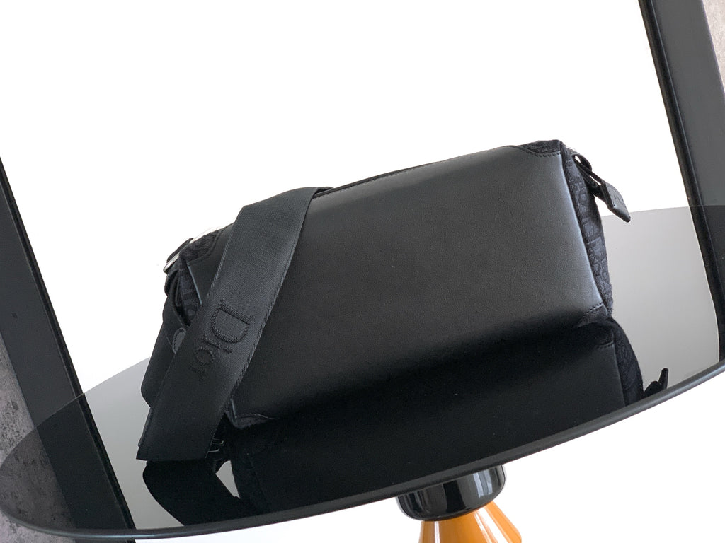Dior flap shoulder bag with smooth front panel and adjustable strap