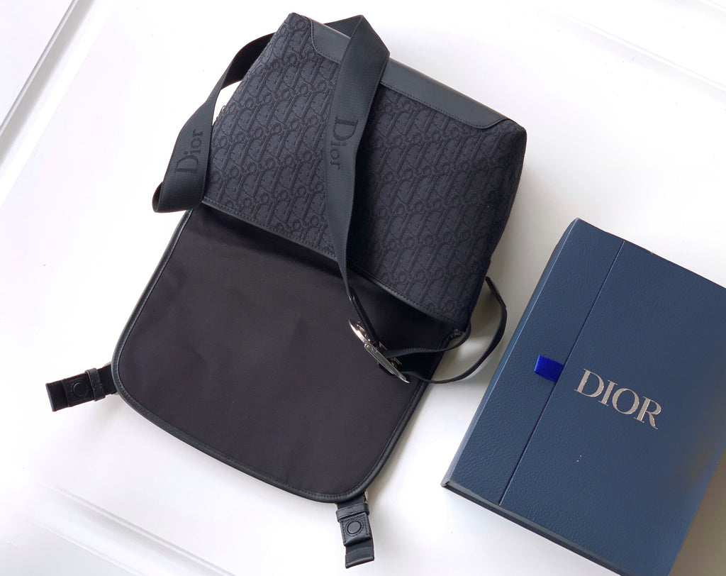 Dior patterned messenger bag with front flap and adjustable shoulder strap