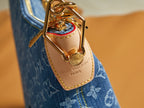 Blue monogram bag strap loop with gold hardware and Louis Vuitton Paris label