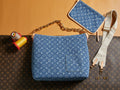 Blue monogram shoulder bag with top handle and gold chain strap