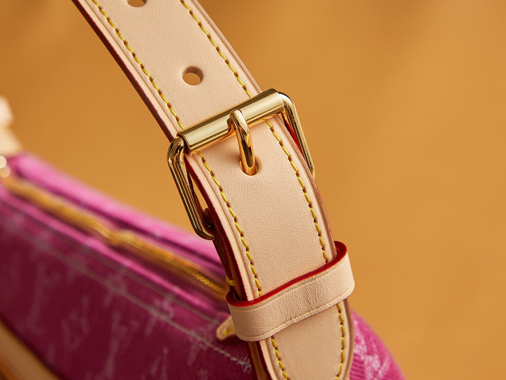 Louis Vuitton bag pink monogram canvas with light beige adjustable strap and gold buckle