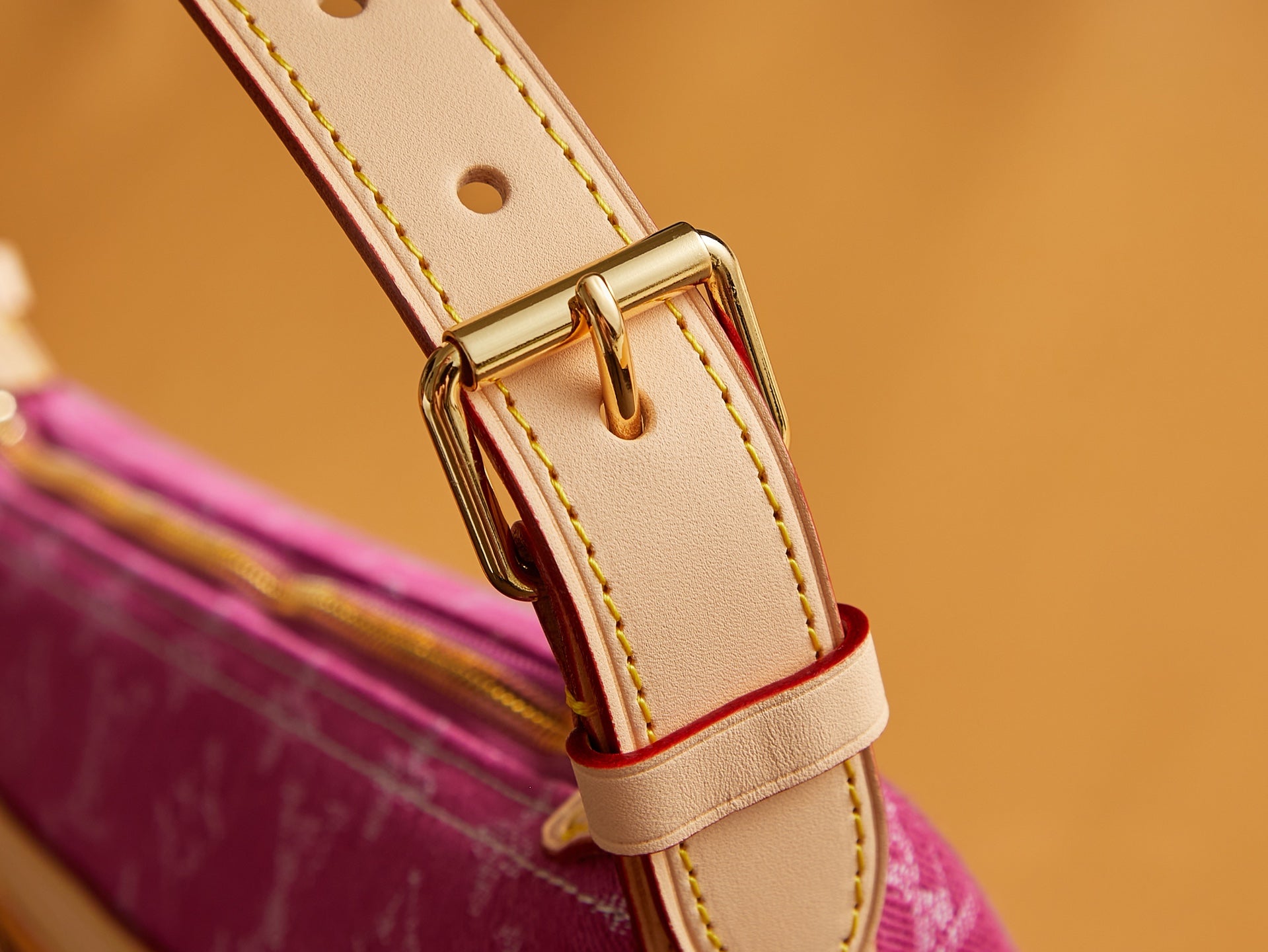 Louis Vuitton bag pink monogram canvas with light beige adjustable strap and gold buckle