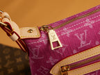 Louis Vuitton bag pink monogram canvas with gold zipper pull and LV charm on strap