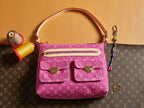 Louis Vuitton bag in pink monogram canvas with top handle and front flap pockets